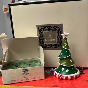 Vtg PartyLite set. Set consists of a candle plate candle Snuffer and 12 votives